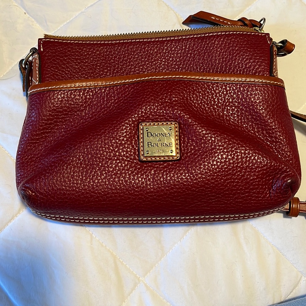 Dark red dooney and Burke cross body purse
